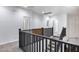 Hallway with carpeted stairs, black metal railings, and recessed lighting at 3419 W Thoreau Ln, Anthem, AZ 85086