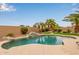 Backyard pool with a rock waterfall feature, mature landscaping, and a beautiful, serene setting at 3790 S Velero St, Chandler, AZ 85286