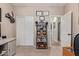 Neutral bedroom with a closet and a decorative shelf at 3907 N 143Rd Ln, Goodyear, AZ 85395