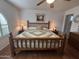 Comfortable bedroom featuring wood floors, a ceiling fan, and classic furnishings at 4026 E Catalina Cir, Mesa, AZ 85206