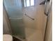 Shower with frosted glass door and grab bar at 4026 E Catalina Cir, Mesa, AZ 85206