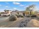 Charming single-story home featuring a well-manicured front yard and a two car garage at 4317 E Williams Dr, Phoenix, AZ 85050