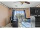 Cozy bedroom featuring a work desk, neutral paint, and a window with views at 4534 E Oberlin Way, Cave Creek, AZ 85331