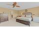 Comfortable main bedroom with a ceiling fan, neutral paint, and large windows at 4534 E Oberlin Way, Cave Creek, AZ 85331