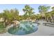 Inviting swimming pool surrounded by tropical landscaping, creating a relaxing outdoor oasis at 4534 E Oberlin Way, Cave Creek, AZ 85331