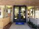 Double glass doors with a clear view to the inside of the building and walkway at 5124 N 31St Pl # 542, Phoenix, AZ 85016