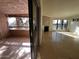 Bright living room features a fireplace, tile flooring, and a sliding glass door to a patio at 5124 N 31St Pl # 542, Phoenix, AZ 85016