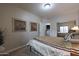 Bedroom features a view of the washer and dryer, art and a mirror at 5350 E Deer Valley Dr # 4430, Phoenix, AZ 85054