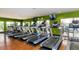 Gym featuring treadmills, elliptical trainers, and outdoor view to the pool and community at 5350 E Deer Valley Dr # 4430, Phoenix, AZ 85054