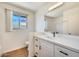 Bright bathroom with a modern vanity and toilet at 5513 W Tierra Buena Ln, Glendale, AZ 85306