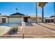 Charming single-story home featuring a desert landscaping and mailbox at 5513 W Tierra Buena Ln, Glendale, AZ 85306