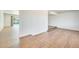 Bright living room with neutral walls and laminate wood flooring at 5513 W Tierra Buena Ln, Glendale, AZ 85306