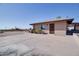 Single level home with garage door and wide driveway at 5962 E Siesta St, Apache Junction, AZ 85119