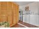 Bright laundry room with brick floors, a white brick wall, and washer/dryer at 5962 E Siesta St, Apache Junction, AZ 85119