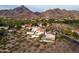 Expansive aerial shot of the community with surrounding golf course and mountain views at 6188 N 29Th Pl, Phoenix, AZ 85016