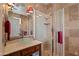 Beautiful bathroom with a glass vessel sink, a tiled shower, and luxurious finishes at 6188 N 29Th Pl, Phoenix, AZ 85016