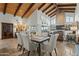 Bright dining area with a wooden vaulted ceiling that is open to the living room at 6188 N 29Th Pl, Phoenix, AZ 85016