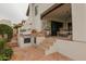 Outdoor kitchen and patio area perfect for al fresco dining and outdoor entertaining at 6188 N 29Th Pl, Phoenix, AZ 85016