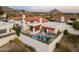 Aerial view of a backyard pool with a patio, lounge chairs, and manicured landscaping at 6188 N 29Th Pl, Phoenix, AZ 85016