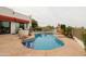 Inviting pool area featuring an attached spa, tile accents, and ample patio space at 6188 N 29Th Pl, Phoenix, AZ 85016