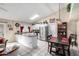 Bright kitchen with stainless steel appliances, white cabinetry, and an eat-in dining area at 6335 E Brown Rd # 1081, Mesa, AZ 85205