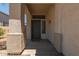 Inviting front entrance with textured column and welcome mat at 6350 W Hess St, Phoenix, AZ 85043