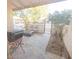 Cozy back patio featuring stone pavers, seating area, and BBQ, perfect for outdoor relaxation and entertaining at 6454 E University Dr # 5, Mesa, AZ 85205