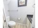 Bathroom with toilet, vanity and artwork at 6454 E University Dr # 5, Mesa, AZ 85205