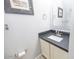 Bathroom featuring a modern vanity with a sink and a framed mirror at 6454 E University Dr # 5, Mesa, AZ 85205