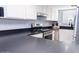 Close-up of the kitchen with stainless steel appliances and dark countertop at 6454 E University Dr # 5, Mesa, AZ 85205