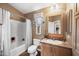 Bright bathroom with a shower-tub combo, vanity, and ample lighting for a functional and inviting space at 650 N Hawes Rd # 3607, Mesa, AZ 85207