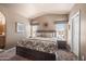 Serene main bedroom features a comfortable bed, soft lighting, and soothing decor for a restful retreat at 650 N Hawes Rd # 3607, Mesa, AZ 85207