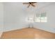 A light-filled bedroom with tile flooring and a ceiling fan at 6720 W Medlock Dr, Glendale, AZ 85303