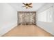 Bright room with tile flooring, natural light, and a unique feature wall at 6720 W Medlock Dr, Glendale, AZ 85303