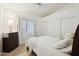 Light and airy bedroom with a large window, closet, and dresser at 698 W Merrill Ave, Gilbert, AZ 85233