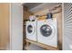 Convenient laundry room includes updated washer and dryer with storage space at 713 N Banning Cir, Mesa, AZ 85205