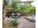 Community grill area with gas grills, lounge chairs, and landscaping at 7147 E Rancho Vista Dr # 3010, Scottsdale, AZ 85251