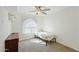 This bedroom features a single bed, carpet, and an AC unit at 7650 E Culver St, Mesa, AZ 85207