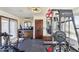 This home gym features exercise equipment and hard flooring at 7650 E Culver St, Mesa, AZ 85207