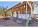 Well-maintained horse stall featuring metal roofing, individual stalls, and ample natural light at 7650 E Culver St, Mesa, AZ 85207