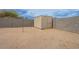 Spacious backyard with cinderblock fencing and a storage shed at 8038 S 25Th St, Phoenix, AZ 85042