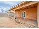 View of a covered patio and cinder block fence in the spacious backyard at 8038 S 25Th St, Phoenix, AZ 85042