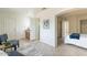 Bright bedroom with tile floors, ensuite bathroom and closet at 8038 S 25Th St, Phoenix, AZ 85042