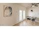 Dining area featuring tile floors, modern light fixture and neutral wall color at 8038 S 25Th St, Phoenix, AZ 85042