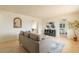 Inviting living room featuring neutral tones, tile flooring, and a comfortable seating area at 8038 S 25Th St, Phoenix, AZ 85042