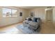 Bright and airy living room showcasing a stylish couch, natural light, and inviting decor at 8038 S 25Th St, Phoenix, AZ 85042