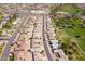 An aerial view of a suburban neighborhood next to a golf course at 10816 W Venturi Dr, Sun City, AZ 85351