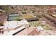 An aerial view of a recreation center with tennis courts and miniature golf at 10816 W Venturi Dr, Sun City, AZ 85351