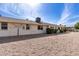 Townhouse exterior featuring low maintenance desert landscaping and security doors at 10816 W Venturi Dr, Sun City, AZ 85351