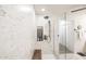 Elegant walk-in shower with marble wall and built in niche at 10825 W El Cortez Pl, Peoria, AZ 85383